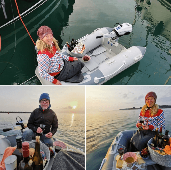 leisure time in a lake | dinghy with a outboard motor