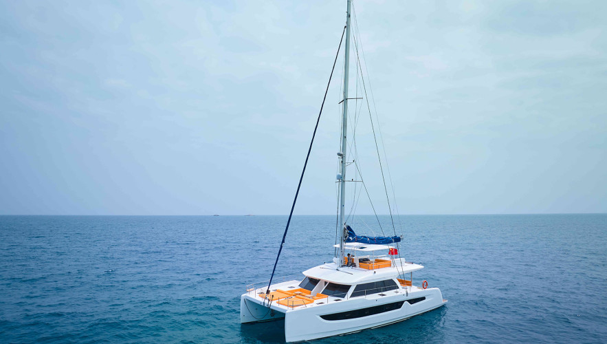 Seaview 59 electric catamaran under solar panels showcasing clean-energy yacht design