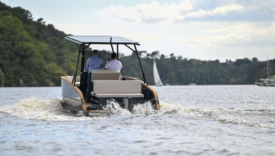 Electric boat stern with solar canopy highlighting key boat parts